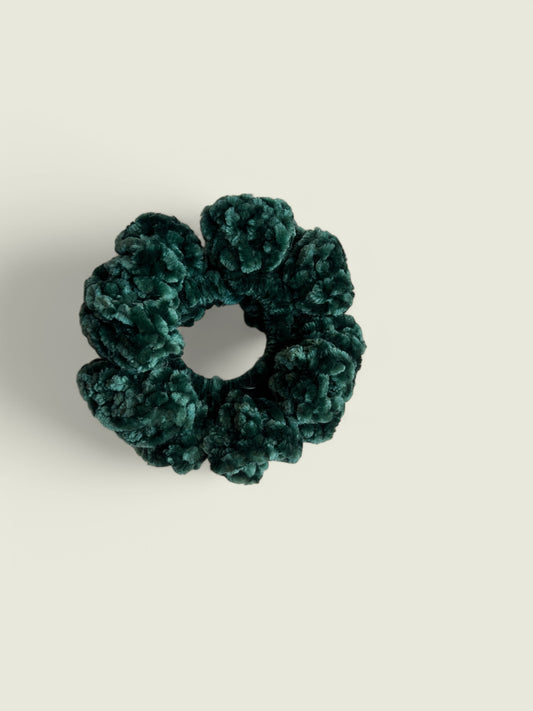 Donkergroene velvet scrunchie